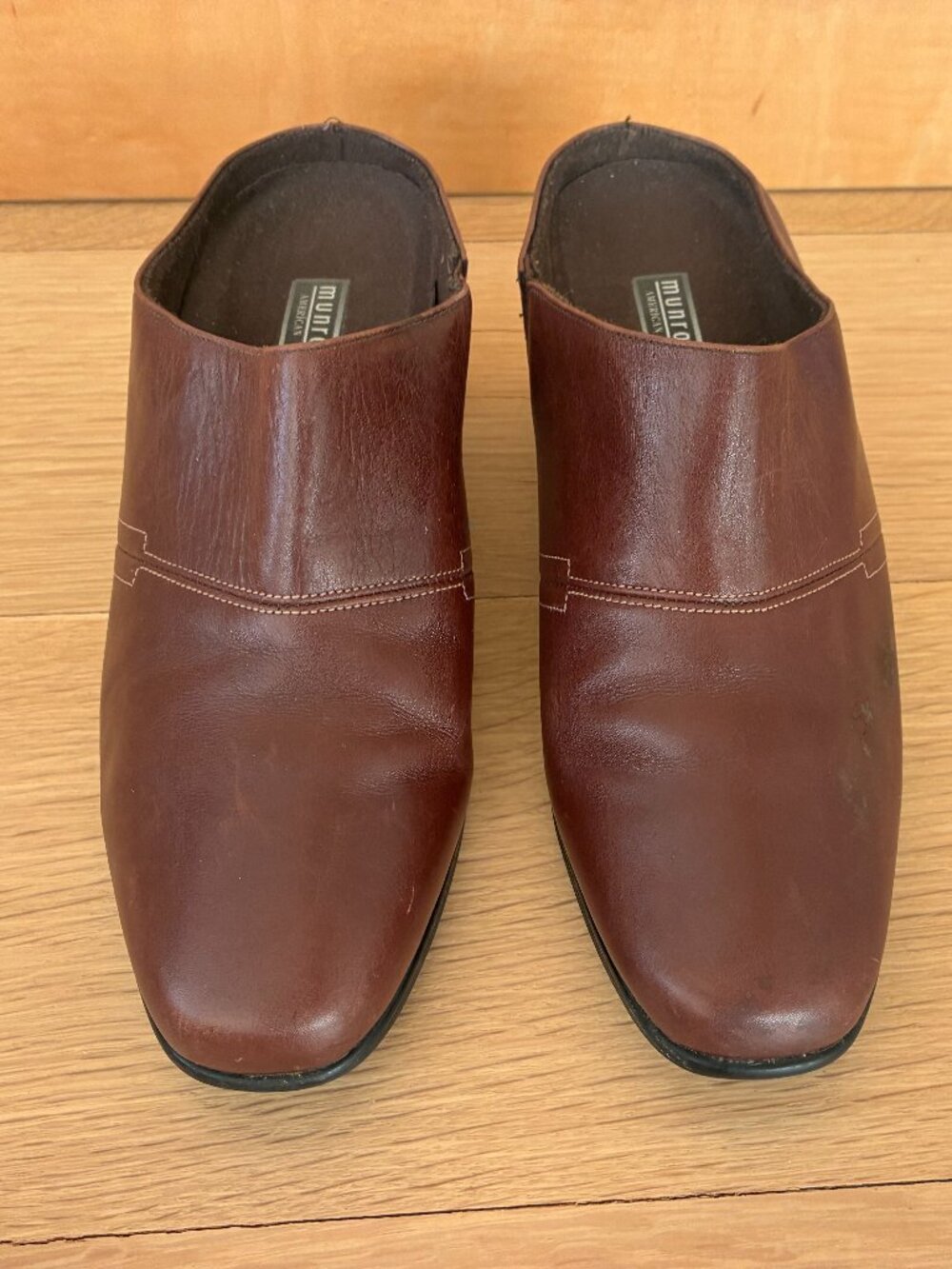 Munro, brown leather mules.